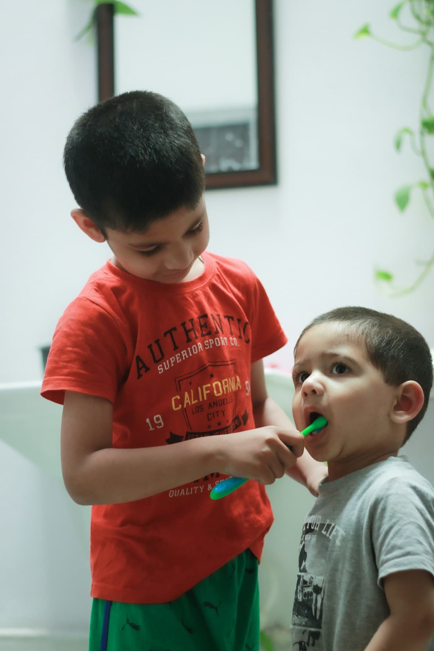 A child learning to brush their teeth